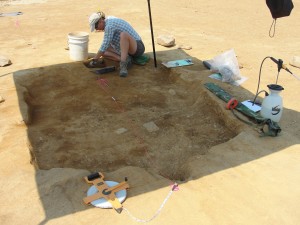 Joell Browning excavates the small sunken-floored building west of the cellar hole