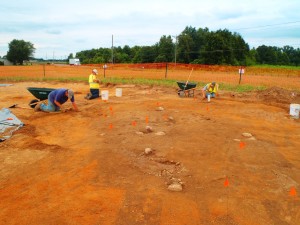 Johnie Sanders, Morgan MacKenzie, and Nathan Sims begin to uncover the root cellar.